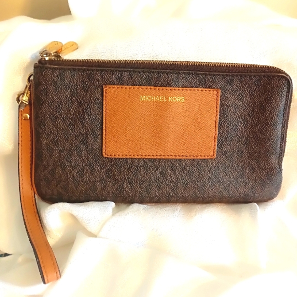 Michael Kors medium coated canvas clutch brown